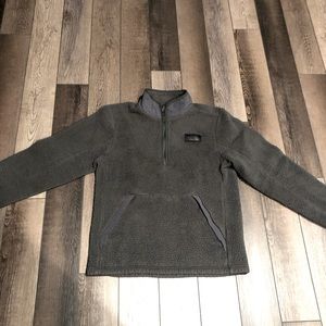 Men’s North Face dark gray 1/2 zip sweater.